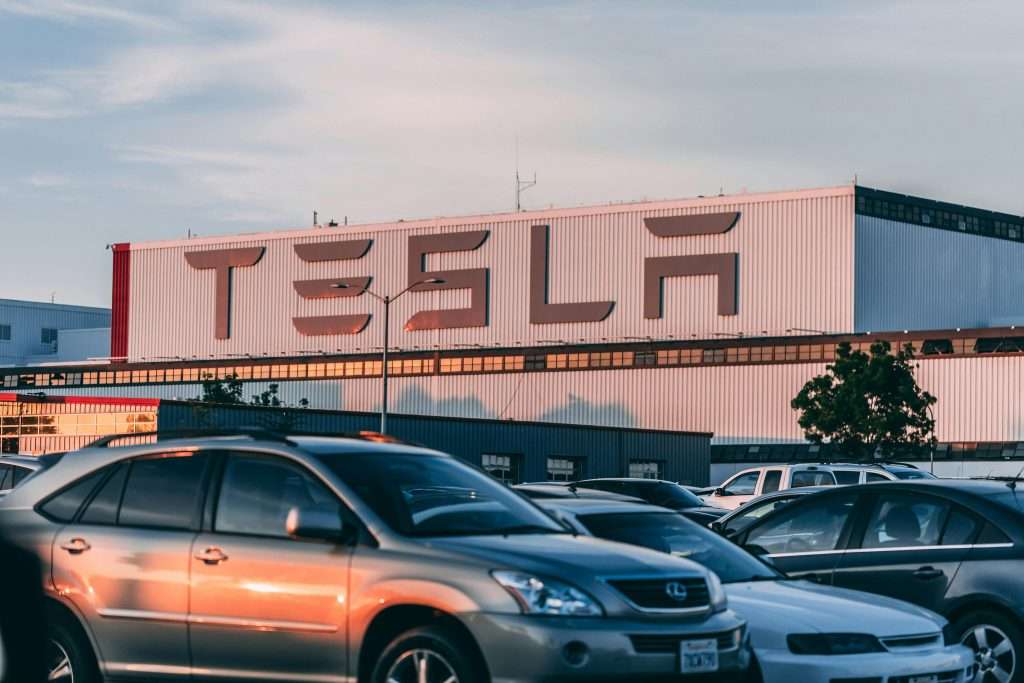 Cars Parked In Front Of Tesla Company Building