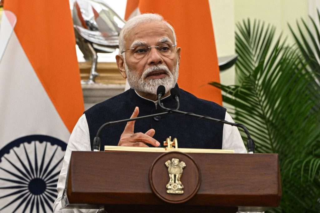 Narendra Modi, India's prime minister, during a news conference with Olaf Scholz, Germany's chancellor, not pictured, at Hyderabad House in New Delhi, India, on Friday, Oct. 25, 2024. Scholz called for further diversification of the nation's trade as he looks to reduce the economy's dependence on China in favor of India. Photographer: Prakash Singh/Bloomberg via Getty Images
